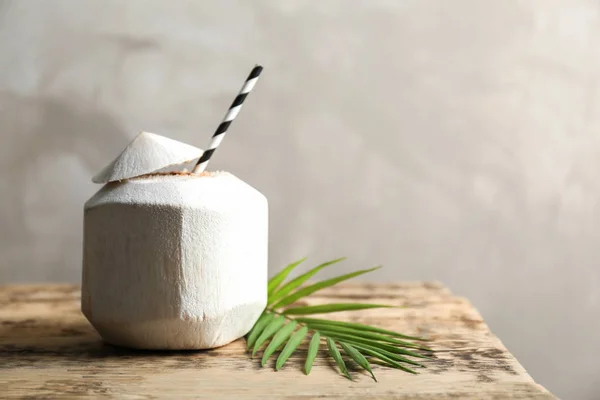 Coconut cocktail with straw — Stock Photo, Image