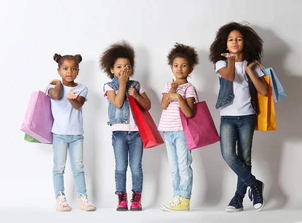 Four Cute African Girls Shopping Bags White Background — Stock Photo, Image