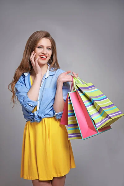 Woman with paper bags — Stock Photo, Image