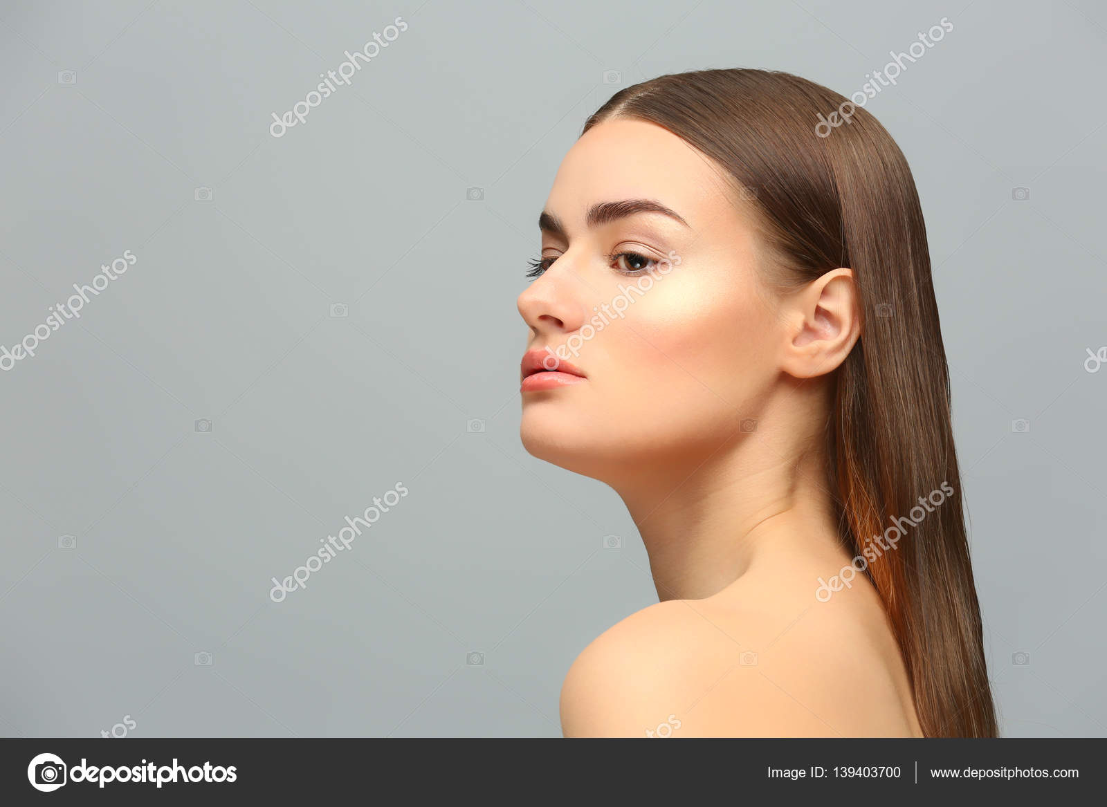Portrait of beautiful young woman — Stock Photo © belchonock #139403700