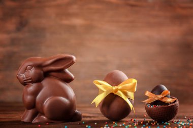 Chocolate Easter bunny with eggs  clipart