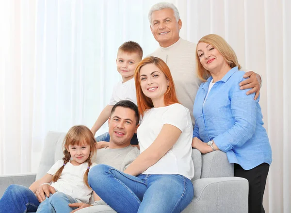 Big family on couch Royalty Free Stock Photos