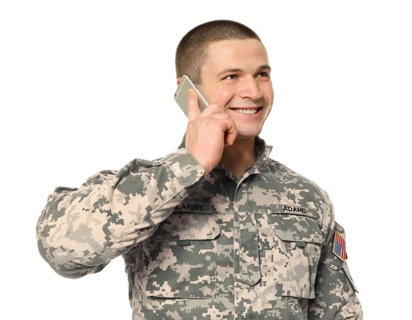 Soldier talking on mobile phone on white background — Stock Photo, Image