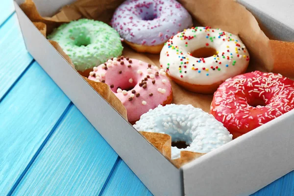 Delicious donuts in box