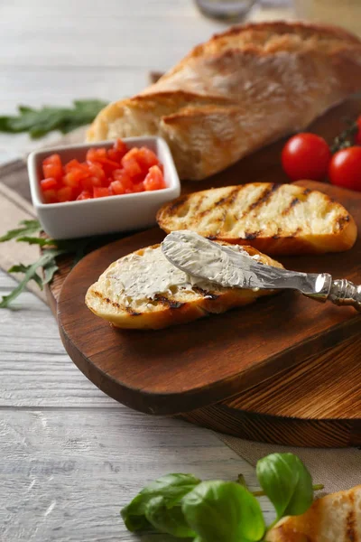 Tasty bruschetta with creamy cheese — Stock Photo, Image