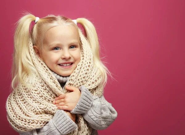 Funny little girl in warm clothes — Stock Photo, Image