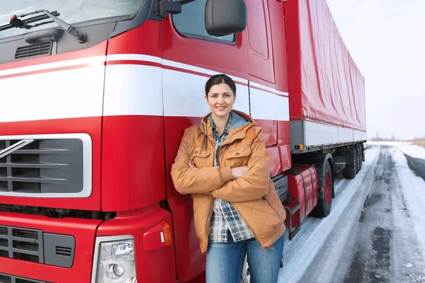 Female driver near big truck