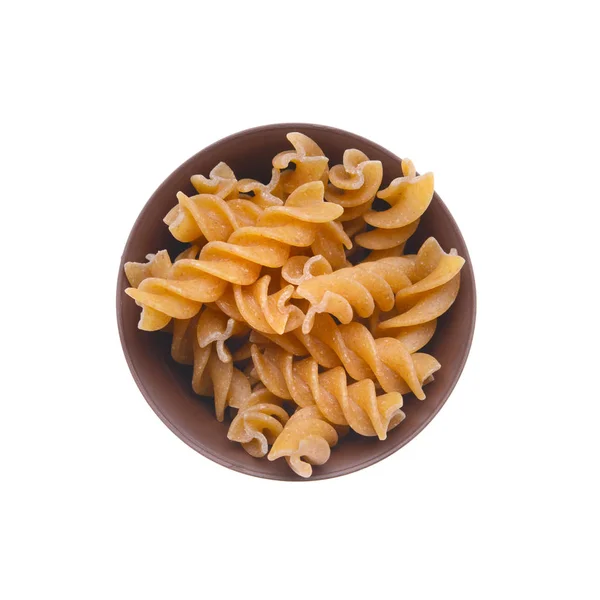 Raw Pasta in bowl — Stock Photo, Image