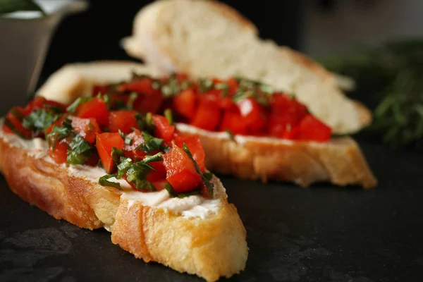 Tasty bruschetta with tomatoes — Stock Photo, Image