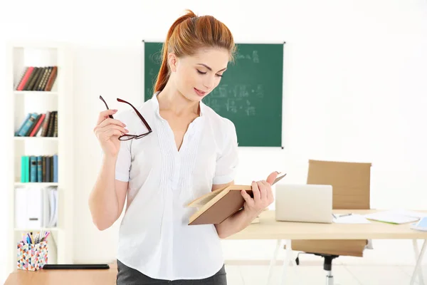 Young teacher at lesson — Stock Photo, Image