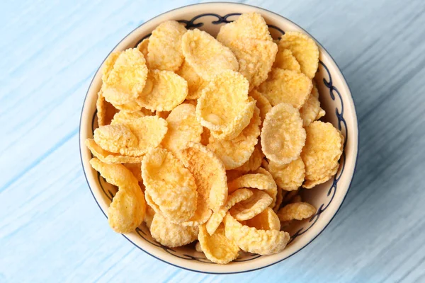 Bowl with raw cornflakes — Stock Photo, Image