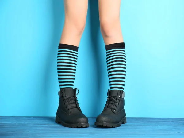 Woman in striped stockings — Stock Photo, Image