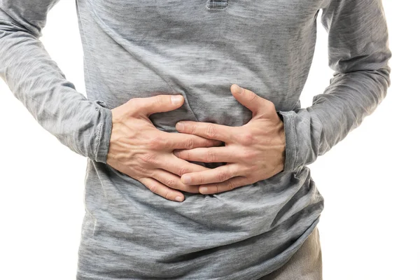 Hombre que sufre de dolor abdominal — Foto de Stock