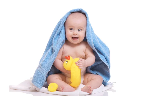 Cute baby with towels and ducks — Stock Photo, Image