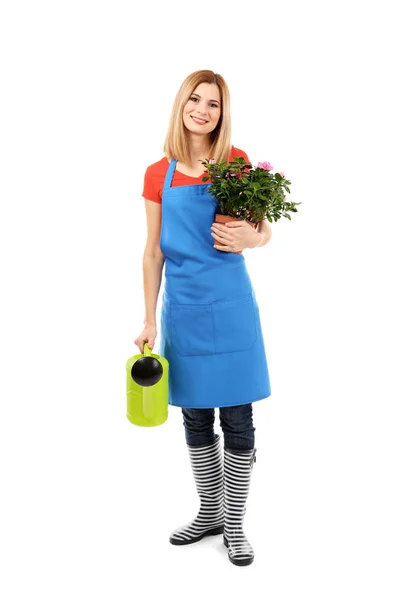 Mulher bonita florista segurando planta — Fotografia de Stock