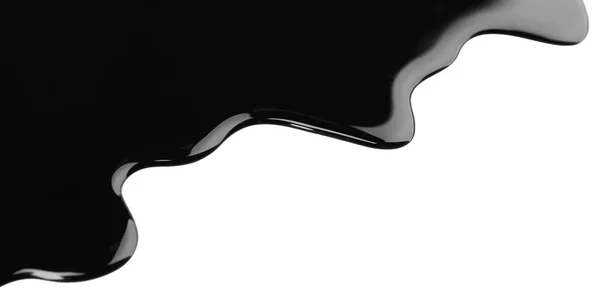 Černá tekutina na bílém — Stock fotografie