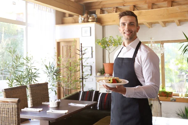 Handsome young waiter — Stock Photo, Image