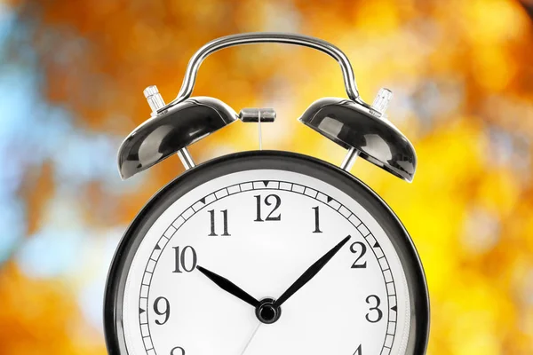 Alarm clock on  yellow Stock Photo