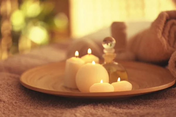 Spa set with candles, oil  and towel — Stock Photo, Image