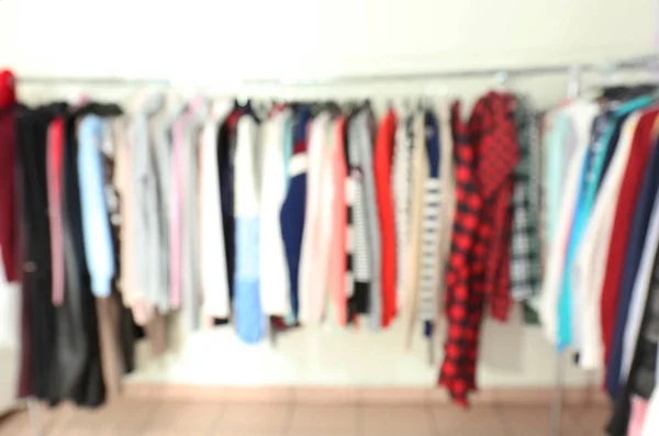 Rack with different clothes — Stock Photo, Image