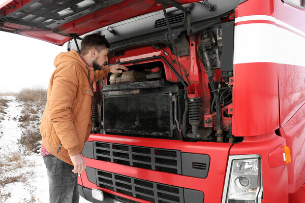 driver near truck outdoors