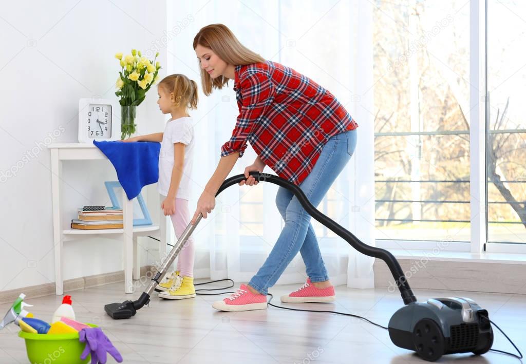 Mother and daughter doing cleanup 