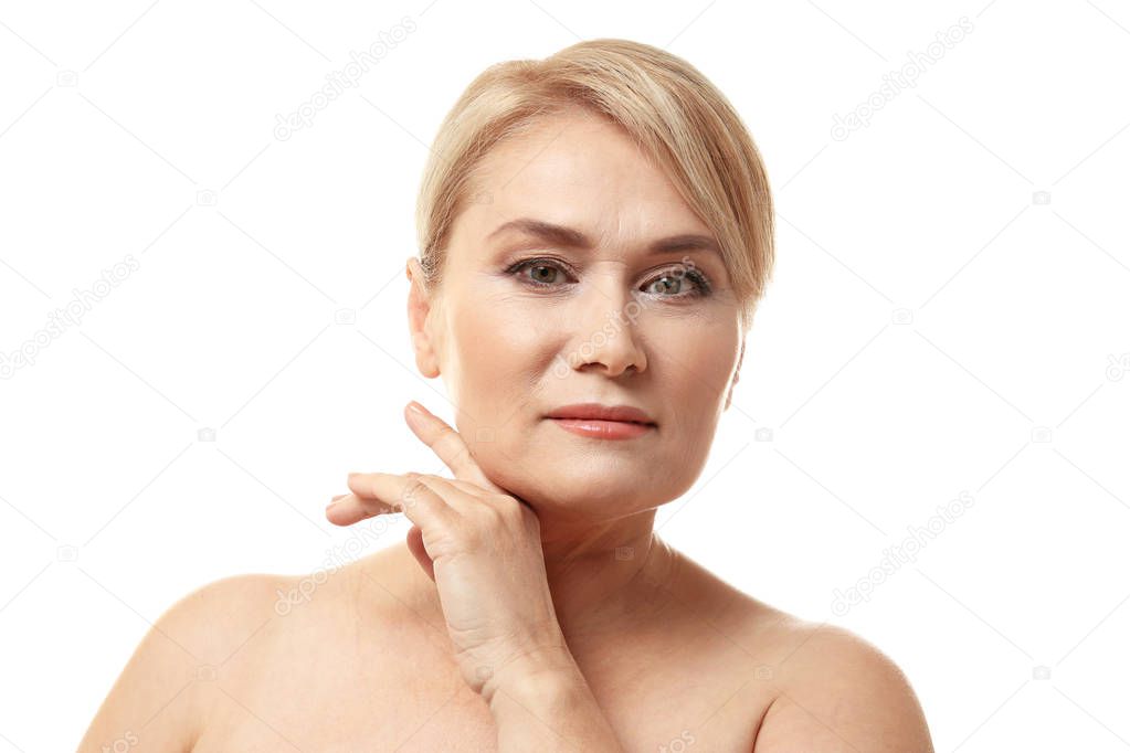 Portrait of mature woman on white background