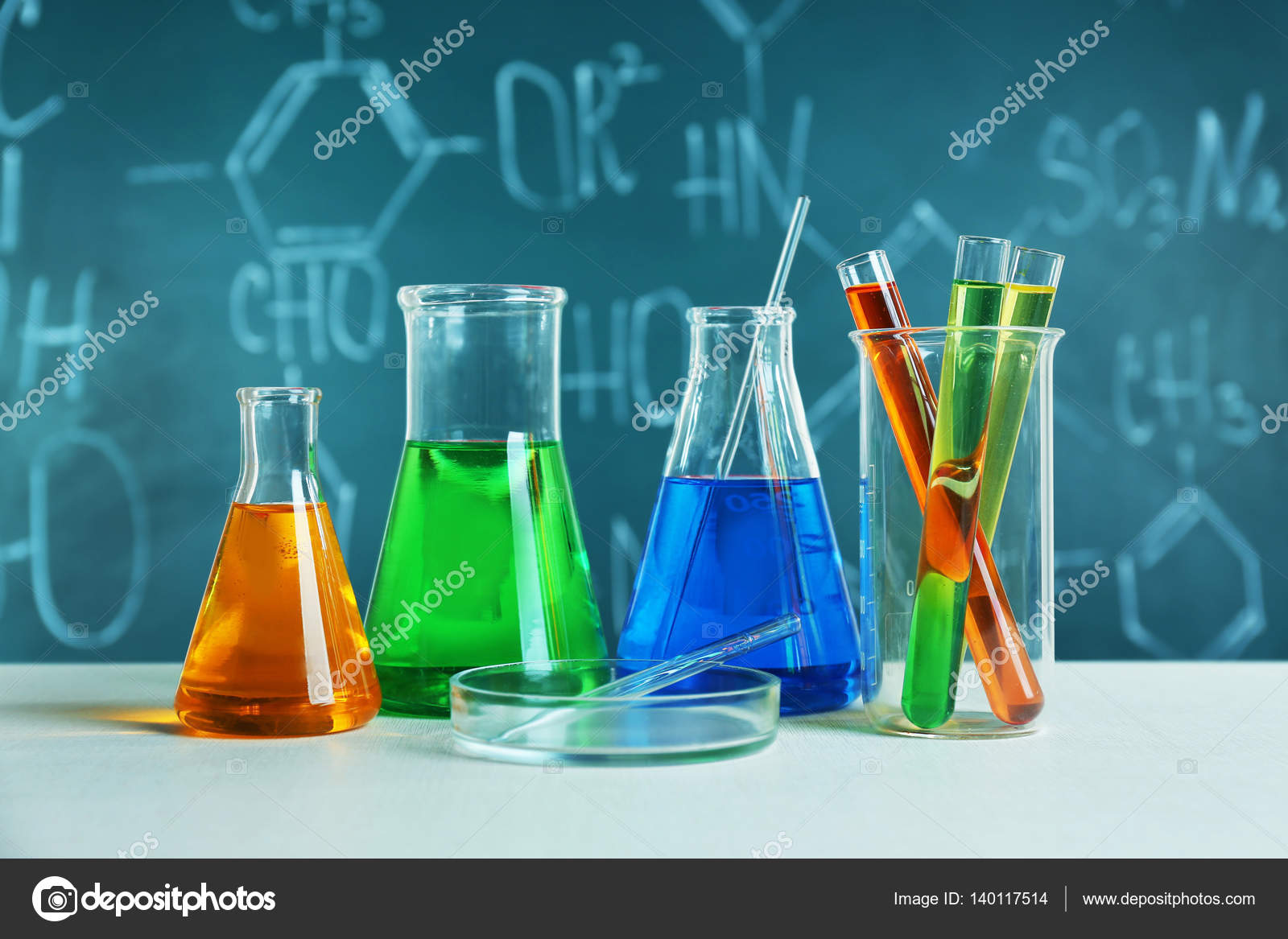 Test beakers and flasks Stock Photo by ©belchonock 140117514