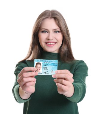 Woman with driving license  clipart