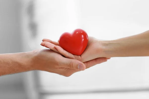 Hands with red heart — Stock Photo, Image