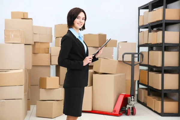 Young woman with clipboard — Stock Photo, Image