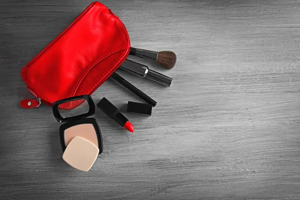 Cosmetic bag and makeup products — Stock Photo, Image