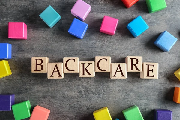 단어 Backcare 나무 큐브 — 스톡 사진