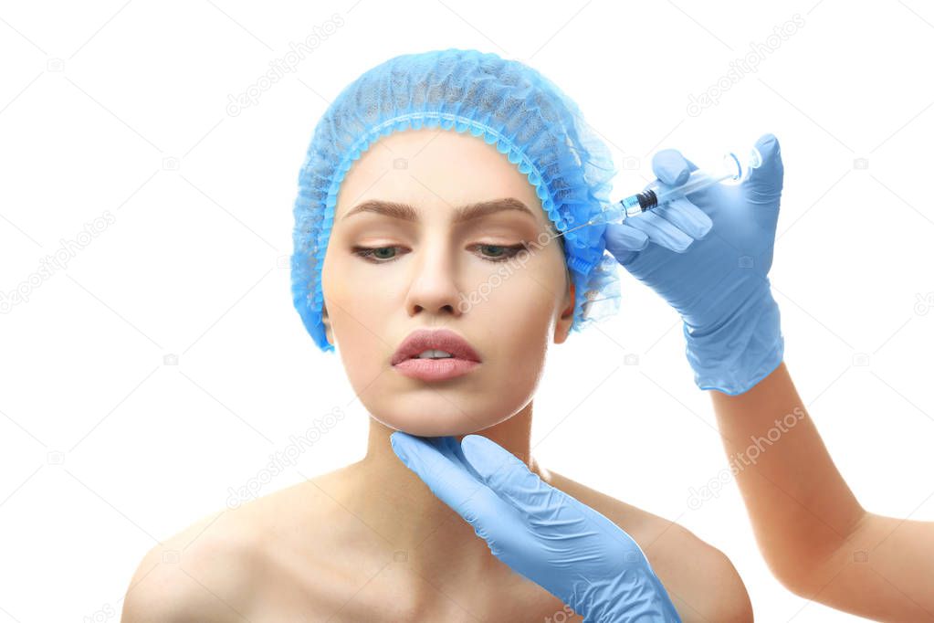 Young woman having cosmetic injection  