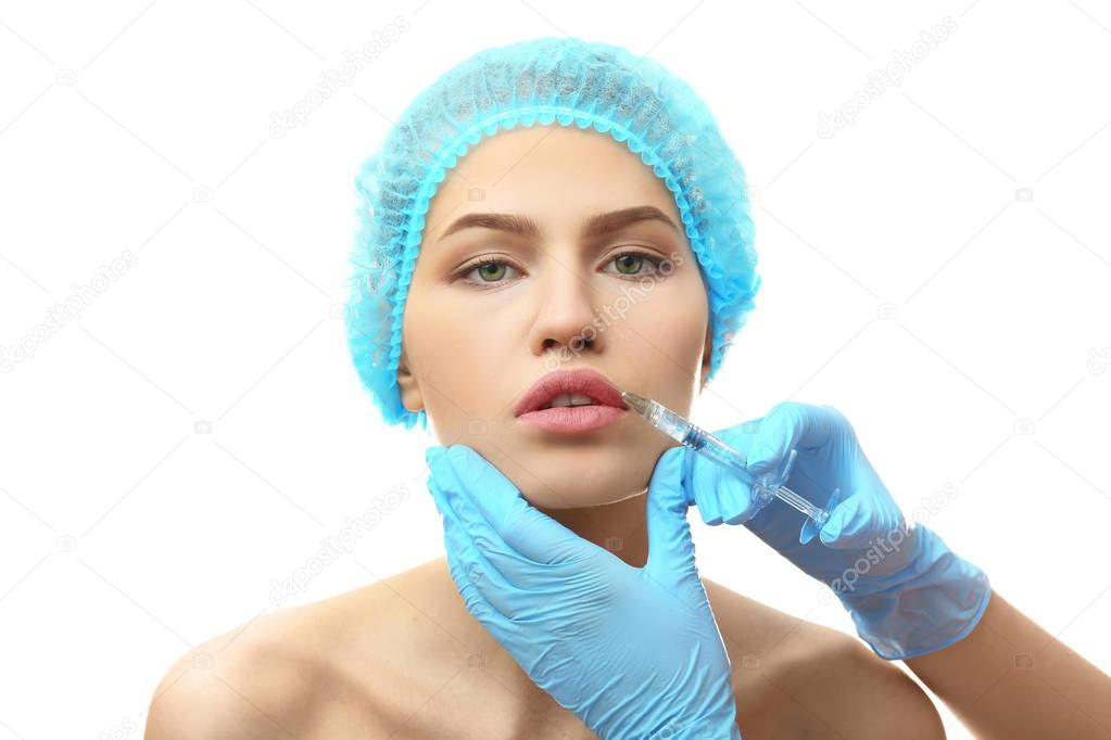 Young woman having cosmetic injection  
