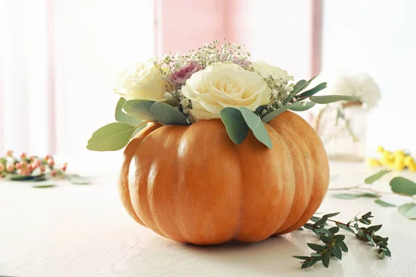 Fresh flowers and pumpkin — Stock Photo, Image