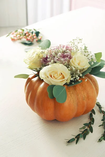 Fresh flowers and pumpkin — Stock Photo, Image