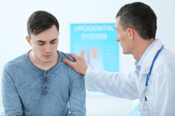 Man with health problem visiting doctor at hospital