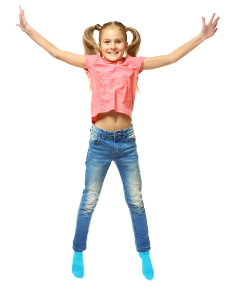 Emotionale kleine Mädchen springen auf weißem Hintergrund — Stockfoto