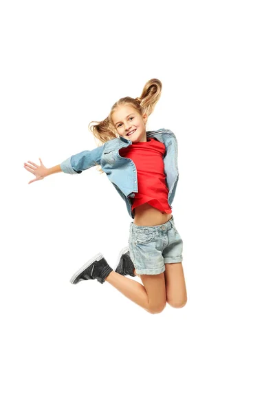 Emocional menina saltando no fundo branco — Fotografia de Stock