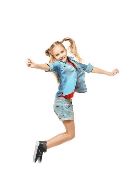Emotional little girl jumping on white background — Stock Photo, Image
