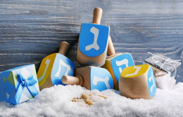 Dreidels for Hanukkah and snow — Stock Photo, Image