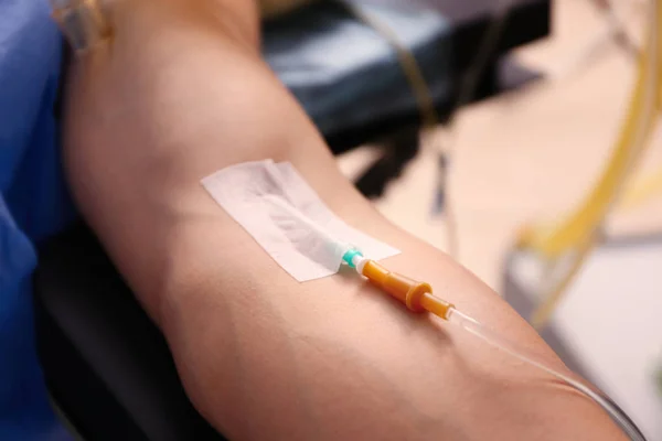 Male arm with infusion drip — Stock Photo, Image