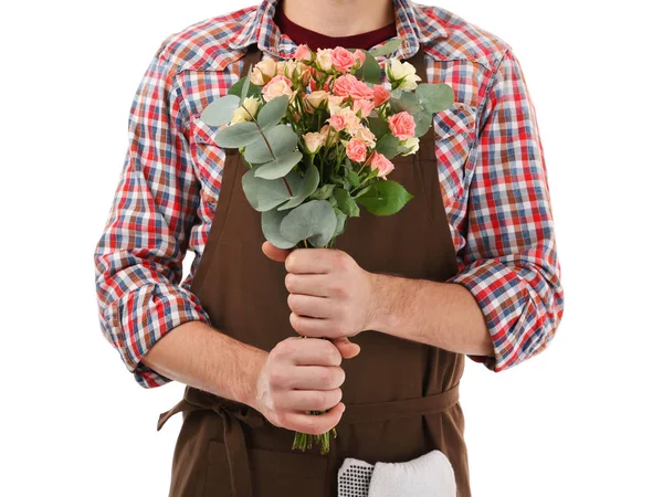 Мужчина-флорист держит цветок — стоковое фото