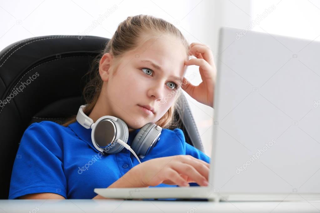 teenager playing computer game 