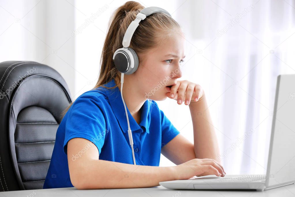 teenager playing computer game