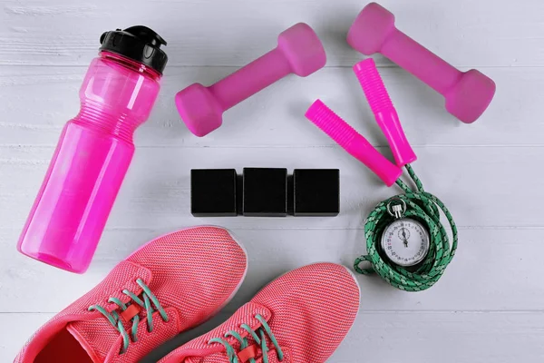 Sneakers, skipping rope and cubes