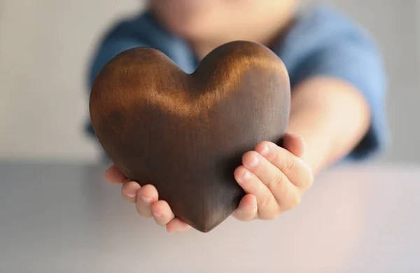 Child holding heart sign — Stock Photo, Image