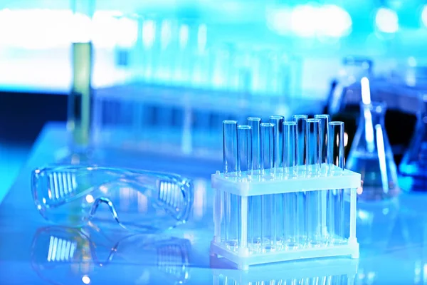 Transparent test tubes in laboratory — Stock Photo, Image