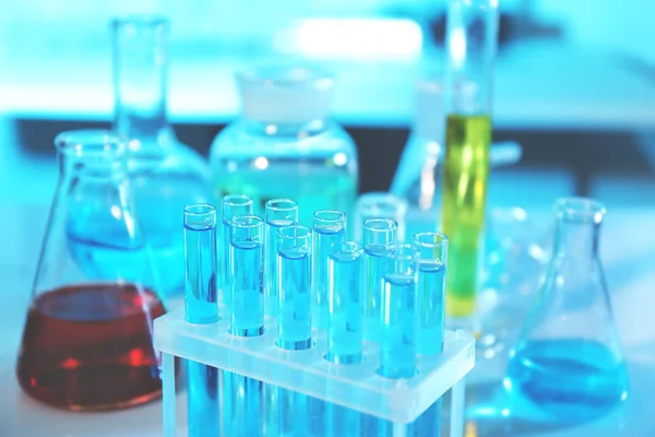 Laboratory flasks with liquid — Stock Photo, Image